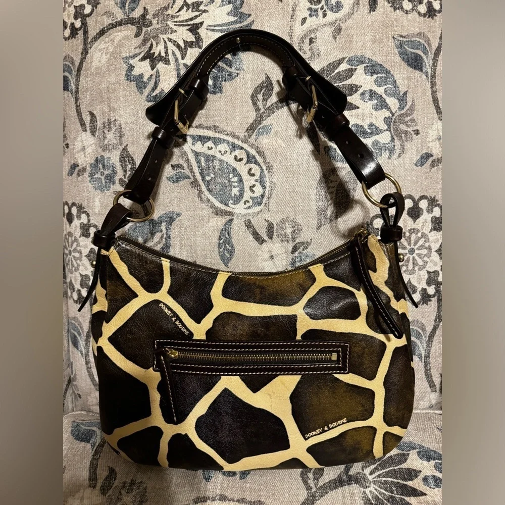 *SPRING CLEANOUT* Dooney and Bourke shoulder bag in a giraffe print style. - Picture 2 of 4